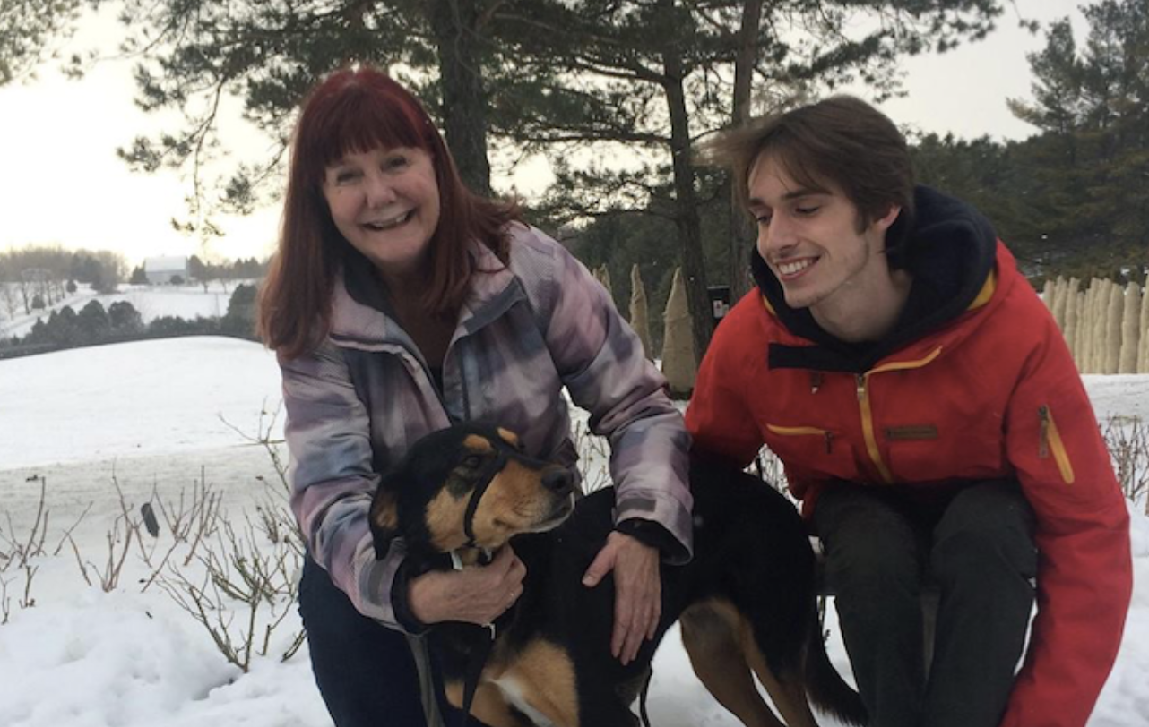 Animal Lovers Home Care team with a dog in the snow